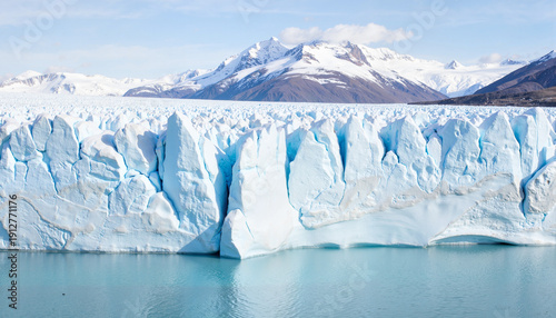 Retreating glacier under bright sky in polar region, climate change