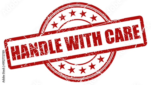 Handle with care red stamp with grunge texture