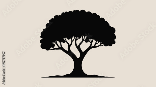 Silhouette of a tree with a thick trunk and lush foliage on beige background