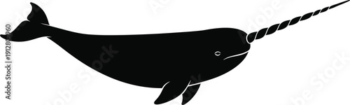 Black silhouette of a narwhal swimming in arctic waters viewed from side profile