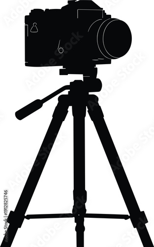Silhouette of DSLR camera mounted on tripod for photography, stability, and professional equipment design themes