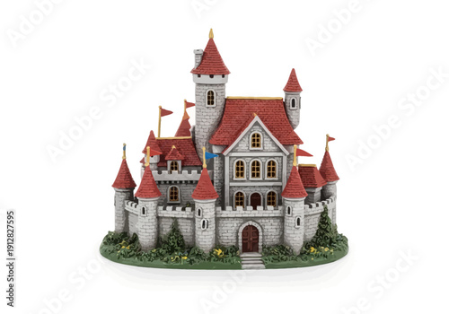 Small model castle with red roofs.