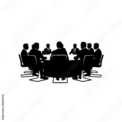 A group of people seated around a conference table in silhouette