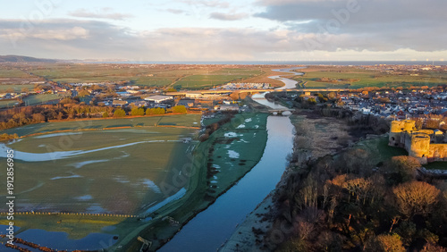 Aerial view of the River Clwyd winding through the landscape at sunrise