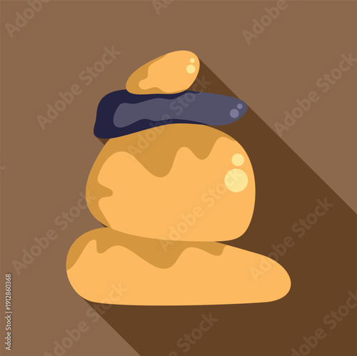 Stacked pebbles forming a cairn representing balance, harmony, and spiritual well being