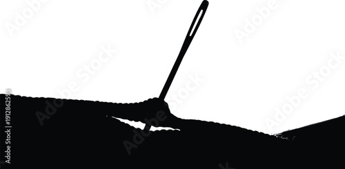 Silhouette of hand writing with pen on textured surface for creativity, communication, and documentation themes in design and illustration