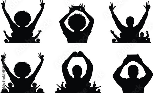 Silhouettes of concert crowd with raised hands, peace signs, heart gestures, and phones capturing the moment at a live music festival or event