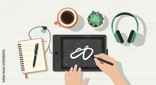 Creative Workspace: Hands Drawing on Tablet, Coffee, Notebook, Headphones