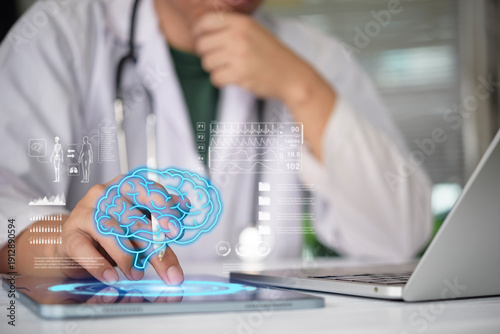 Photography Doctor analyzing digital brain hologram on tablet with medical data interface