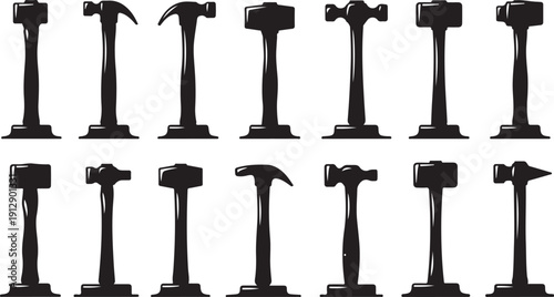 Collection of various black hammers on stands displayed