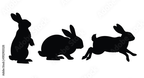 Three black silhouettes of rabbits in various poses against a white background