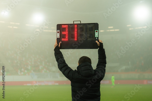 Cuadro en lienzo Technical referee shows players substitution during football match