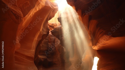 Dramatic red rock canyon with sunbeam and dust in Lower Antelope Canyon Arizona, Navajo Nation territory landscape, sandstone formations and desert travel destination