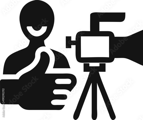 Happy Professional Cameraman Gives Thumbs Up Beside Tripod Mounted Video Camera