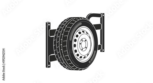 Spare tire mounted on a wall bracket with a silver rim and black tire tread