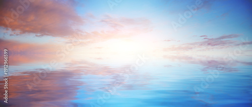 Nature composition of colorful sky background on the sunset and water reflection.