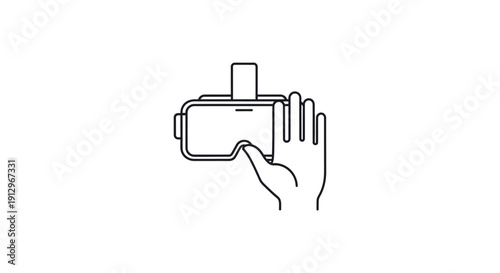 Hand holding virtual reality headset device.