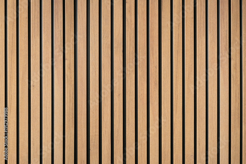 Fotografie Wood lath panels creating vertical timber texture pattern