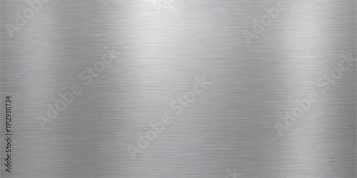 A polished stainless steel plate with a brushed metal texture creates a shiny silver metallic surface pattern, featuring a grey industrial aluminum sheet or titanium alloy background