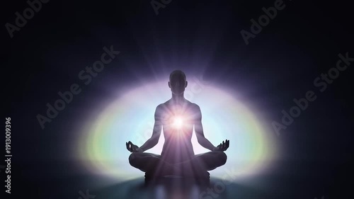 Silhouette of Person Meditating in Lotus Pose with Radiant Light Emanating From Chest Against a Vibrant Gradient Aura Background Symbolizing Inner Peace and Spiritual Awakening
