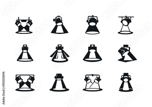 Spotlight Logo Variations. Spotlight shining on stage. Icon set. Set Logo of Spotlight shining on stage: overhead stage light fixture. harmonious
