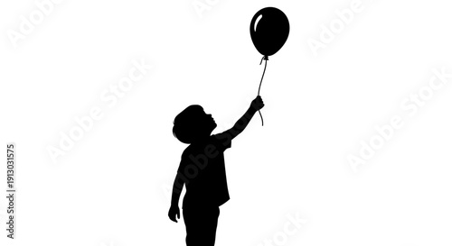 Silhouette of a child holding a balloon.