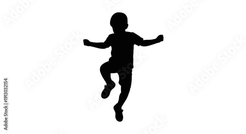 Silhouette of a Child Jumping Freely.
