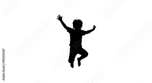 Silhouette of a Happy Child Jumping.