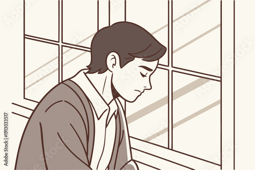 Pensive Young Man Sitting by Window in Quiet Reflection