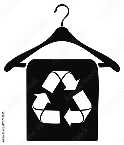 Clothing hanger with a recycling symbol for sustainable fashion concept