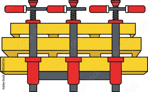Three heavy-duty screw clamps secure a stack of thick yellow rectangular material against intense pressure.