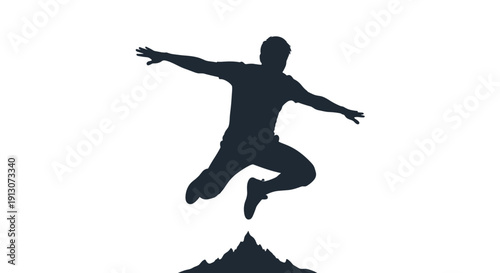 Man jumping on mountain peak.