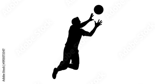 Man jumping to catch ball.