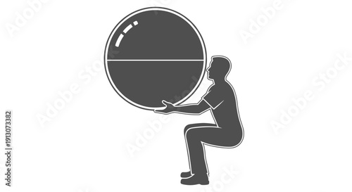 Man lifting a heavy wheel.