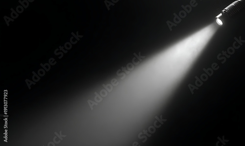 Spotlight Shines Light On Dark Background
