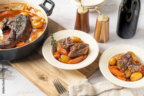 Obraz na plátně Hearty food. Beef pot roast with roasted vegetables