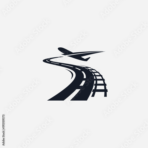 Airplane Flying Over Road and Railway Tracks.