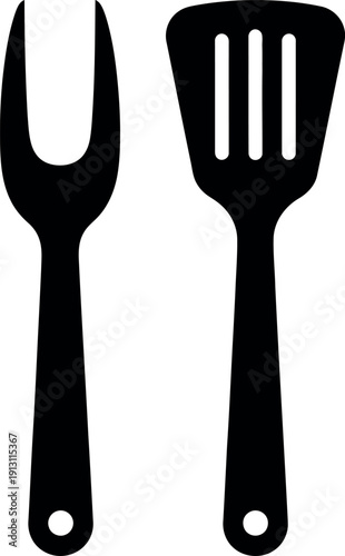 Black silhouette of a fork and spatula set against a plain background
