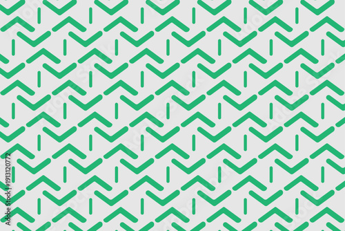 Abstract Chevron Pattern Design. A vibrant design features a repeating chevron pattern in shades of green on a neutral background, offering a visually appealing and modern aesthetic.