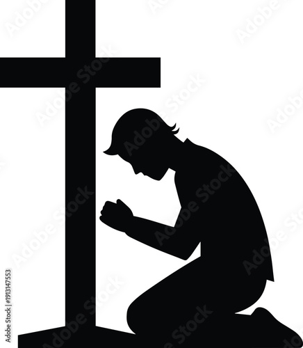 A silhouette of a person kneeling in prayer before a large stark black cross against a white background
