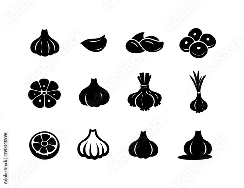 Garlic Icon Set. Garlic. Solid icon set of Garlic: garlic bulb, garlic clove, peeled garlic, sliced garlic, garlic head top view, garlic silhouette, garlic