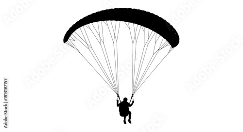 Person paragliding in the air.