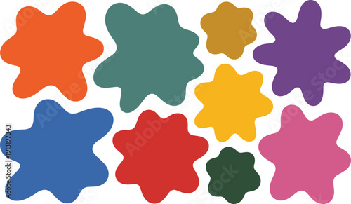 Playful arrangement of bright multi colored organic shapes floating on a crisp white backdrop