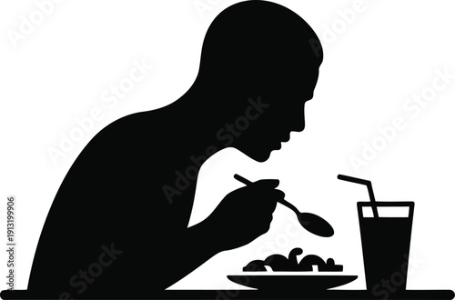 Striking black silhouette of an individual eating a small meal from a plate with a spoon and beverage