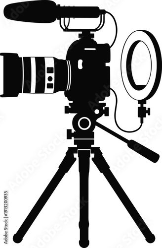 Professional camera setup with tripod, lens, microphone, and ring light silhouette representing photography, vlogging, and video production