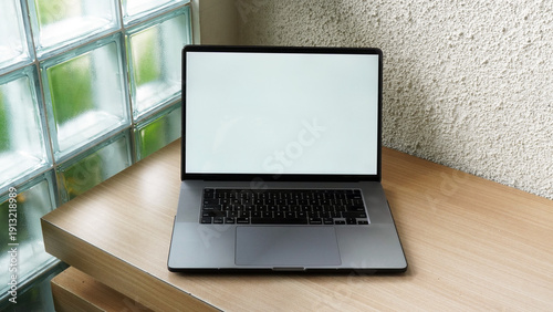 Modern Space Gray MacBook Pro Mockup on Minimalist Wooden Desk with Blank Screen
