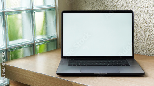 Modern Space Gray MacBook Pro Mockup on Minimalist Wooden Desk with Blank Screen