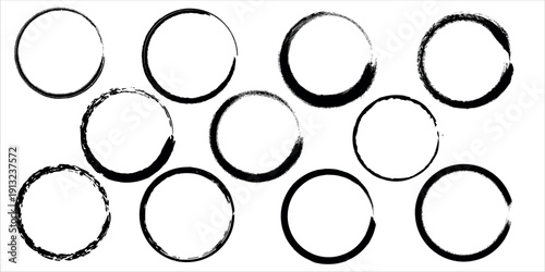 A collection of ten black circles on a white background with varying line widths and imperfections