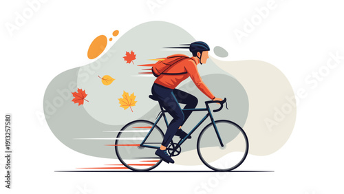 Male cyclist rides his road bike at high speed during the autumn season with falling maple leaves and motion blur.