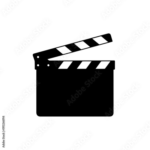 Classic film clapperboard resting on a black background